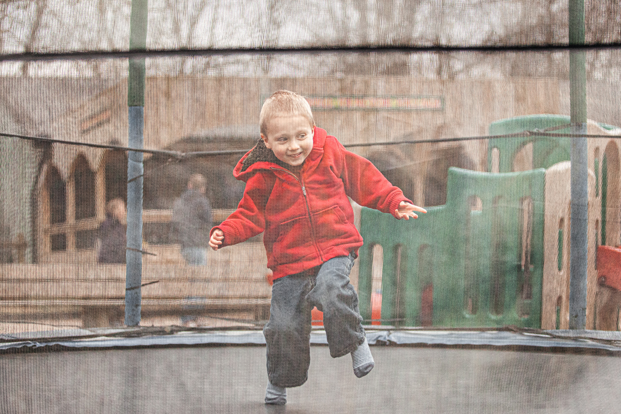 young boy in Pennywell farm park on a trampoline.
